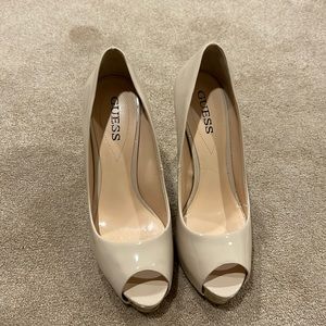 Beige open toe platform heels with gold heel. Minor scuffing on one shoe.